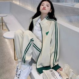 Tweedelige broek-broeksets voor dames Koreaanse mode Casual trainingspak Losse rits Sweatshirt met lange mouwen Jas Broek 2-delig Sportkleding Bijpassende set 231124