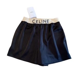 Tweedelige broek van dames CE24SS nieuwe azijnzuur shorts modieus en veelzijdig, presenterende benen, lange slanke letter bedrukte lintdecoratie