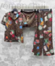 Pantalon de pantalon à deux pièces de marque de concepteur de marque d'été colorée pyjamas à imprimé coloré avec pantalon pantalon à bascule élastique à manches courtes à manches courtes 0G78