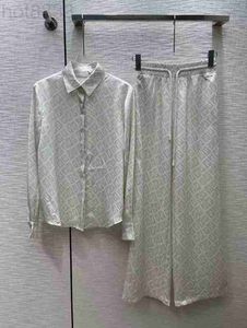 Dames tweedelige broek Designer Luxe 2023 Nieuwe lente zomer revershals lange mouw print shirts merk dezelfde stijl 2 sets mg19