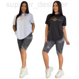 Dames tweedelige broekontwerper Q6077 Nieuwe zomer hete gestempelde casual korte mouw+shorts set 1xvll