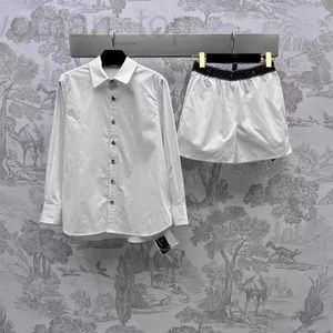 Dames tweedelige broek Designer Spring en Summer Nieuwe Casual minimalistische stijl Flip Collar Shirt+Contrasterende High Tailed A-Line Short Set AQ3K