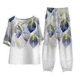 Tweedelige broek voor dames elegante korte slev met losse broek zomer casual tweedelig set bloemenprint dames outfits o nek bovenste hoge taille broek herfst y240426