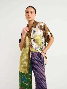 Pantalon de deux pièces pour femmes mode personnalisé personnalisé à manches courtes à manches courtes à manches courtes colorées