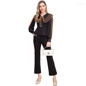 Pantalones de dos piezas para mujer Janeyiren Fashion Catwalk Otoño/Invierno Pantsuit Peplum de manga larga de un solo pecho Top negro 9 minutos 2 traje