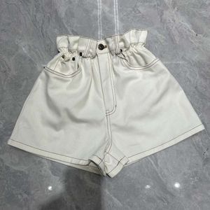 Tweedelige broek voor dames M24 lente/zomer serie pocket borduurbrief elastische bloemknop taille ontwerp, leeftijd vermindering veelzijdige denim shorts