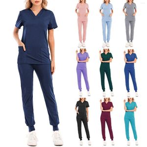 Pantalones de dos piezas para mujer Uniformes de enfermería Pantalones cortos unisex Conjuntos de exfoliación Camiseta con bolsillo de manga Camiseta holgada para salón de belleza Ropa de trabajo Monos de talla grande