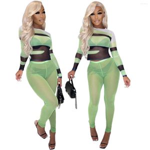 Dames tweedelige broek Sexy Mesh 2 Pieces Club -outfit vrouwen zien door fluorescerende groene clubkleding lange mouw o nek patchwork top en