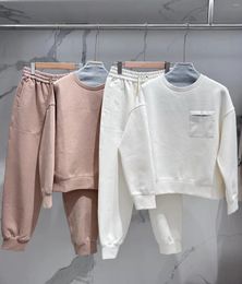 Pantalon deux pièces pour femmes, costume de sport, poche, chaîne de perles, pull à col rond et taille élastique longue