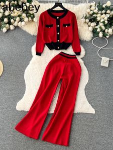 Pantalon de deux pièces pour femmes hiver 2024 ensembles tricotés rouges mode manches longues col rond patchwork tricots pantalons à jambes larges femmes ol pull pièces
