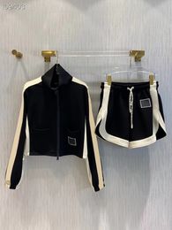 Dames tweedelige broek met letter elastische taille zwarte korte streetwear mode turn-down kraag 22ss nieuw trainingspak