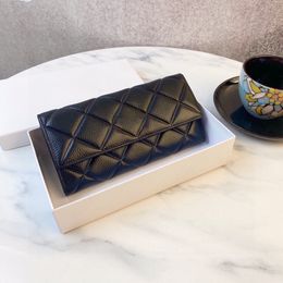 Bolso de almacenamiento de billetera para mujer, modelo de temperamento negro atmosférico de gama alta con patrón de diamantes de cuero de marca de alta gama, 19x10
