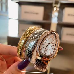 Reloj de mujer con cabeza de serpiente, reloj de cuarzo de tres colores, banda de acero de serpiente de alta calidad, reloj de lujo con tres anillos, reloj de diseñador de diamantes