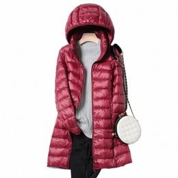 Vestes d'hiver pour femmes 2021 Nouveau manteau d'hiver portable ultra léger à capuche femme veste en duvet de canard capuche coupe-vent amovible q7Nd #