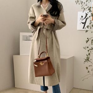 Femmes laine mélanges femmes élégant Long manteau 2023 hiver Style coréen Trench à lacets taille décontracté couleur unie col rabattu pardessus