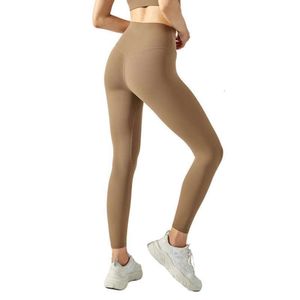 Pantalons de yoga pour femmes Leggings Nude Lycra taille haute hanche ascenseur femmes une pièce course tenue de fitness