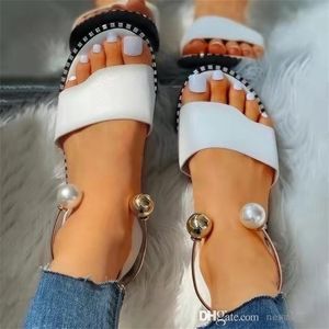 Sandalias de mujer, novedad de verano, ocio, parte inferior plana, espalda vacía, perla, una línea, chanclas de diseñador, zapatos de talla grande para mujer NM