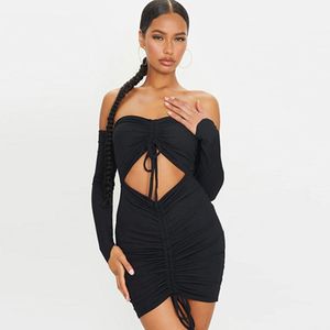 Femmes sexy sans bretelles robe plissée sans dos féminine noire à manches longues Bodycon bandage mini-robes pour le club de fête 210517