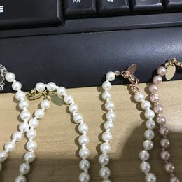 Cadena corta de perlas para mujer, collar de órbita de diamantes de imitación, cadena de clavícula, gargantilla de perlas barrocas, collares para mujer, regalo de joyería