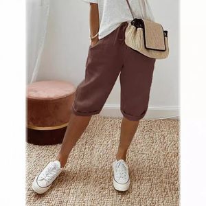 Femmes shorts de style vintage Pantalon de serrage en vrac lâche pour les dames, taille élastique respirante avec poches une garde-robe 2404161