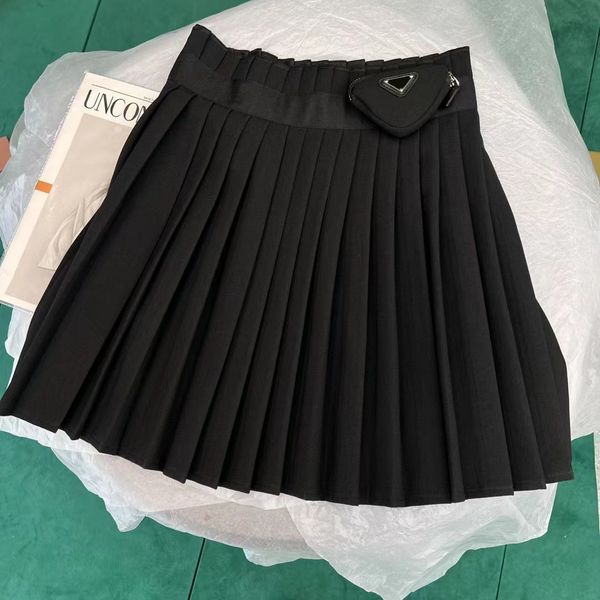 Vestido casual de falda para mujeres para mujeres vestidos de letras modelos triangular etiqueta plisada falda de falda de cintura delgada de las mujeres HiP Una palabra de color sólido mediociestal