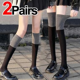 Calcetines de mujer 1/2 pares de invierno tubo largo sobre la rodilla mujer negro gris empalme Preppy Lolita JK pantorrilla Cosplay Color a juego