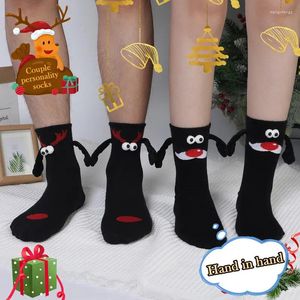 Chaussettes magnétiques pour femmes, 1 paire, célébrité de Club, Couple Ins, mode, Attraction créative amusante, mains noires, yeux de dessin animé de noël