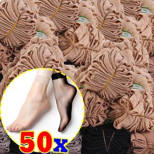 Femmes chaussettes 10-50pcs peau noire Sexy ultra-mince bas femme Transparent Nylon cristal court cheville chaussette antidérapant soie Meias