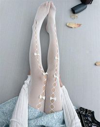 Femmes chaussettes Style japonais doux fille Lolita dentelle trou creux à la main arc mignon fleur mariage bas maille collants