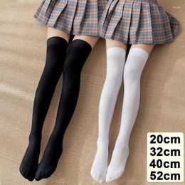 Femmes chaussettes JK femme mignon noir blanc Lolita long serré couleur unie genou haute mode Kawaii Cosplay Sexy bas en Nylon