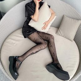 Femmes chaussettes sexy lettres japonaises imprimer des collants de collants irréguliers tatouages à motifs de serres soyeux sans couture