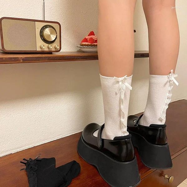 Calcetines de mujer Color sólido negro blanco JK estilo japonés escuela niñas algodón largo Lolita Kawaii Bowknot encaje volante