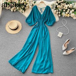 Vrouwen Solid Rompers Korean V Neck Backless Puff Sleeve Jumpsuits Summer Chic Elastic Ruched Wide Leg Rompers 210715