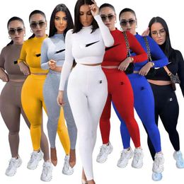 Dames effen trainingspakken korset 2-delige set lange mouw rits bodycon sexy streetwear bijpassende outfit kleding trainingspakken