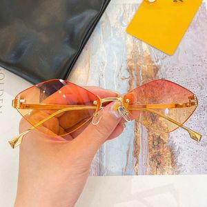 Vrouwen zomer FE4085 geometrische frame zonnebrillen ontwerper nieuwe metaal frameloze geometrische oranje lens buiten strand vrije tijd zonnebril met doos