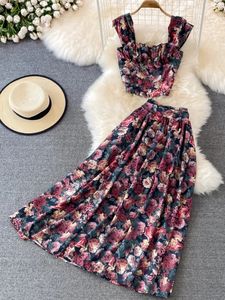 Vrouwen zomer retro bloemenprint rok set sexy mouwloze korte riem tops hoge taille geplooide rok tweedelig pakken 240412