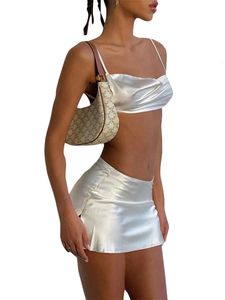 Vrouwen zomer sexy satijn 2 -delige rok sets massieve mouwloze spaghetti -band crop tops bodycon Backless Mini Dress Party Outfits 240321