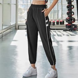 Vrouwen joggingbroek Elastische hoge taille sportbroeken workout Side gestreepte hardloop trainingsbroek Fitness Yoga Jogger 240412