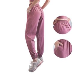 Pantalon de yoga pantalon de survêtement avec poches pantalons sportifs minces de taille haute hauteur