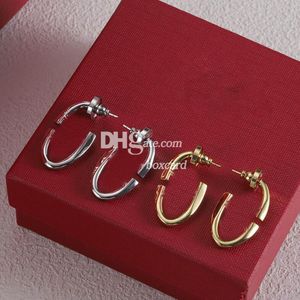 Mujeres Titanium Metal Dangler Trendy Golden Drop Pendientes plateados con caja