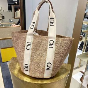 Mujeres Diseñador Bolsos de paja Cross Body Madrina Madre de embrague Bolsos de vacaciones Bolsos de mango de mango de mano superior Bolsas de playa de hombro