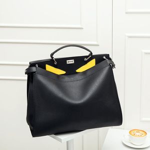 Femmes Totes Petits yeux de monstre Sac fourre-tout Sacs de créateurs Hommes Messenger Sac Luxurys Sac à main épaule en cuir bandoulière sacs à main d'affaires 221220