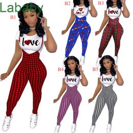 Femmes Survêtements Deux Pièces Pantalons Tenues Designer Saint Valentin Lettres De Déplacement Motif Imprimé Costumes Mince Sexy À Manches Courtes Jarretelles Sportwear 15 Styles