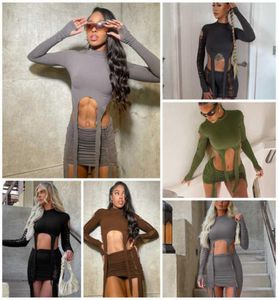 Vrouwen tweedelige kledingontwerper sexy mode 2022 herfst nieuw gat lange mouw top fit korte roksets 4 kleuren3655604