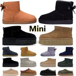 Mujeres ultra mini botas de nieve zapatilla de invierno popular Tobillo Piel de oveja piel de felpa mantener botas calientes Australia Australie Tazz Uges botines de diseñador