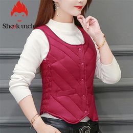 Gilet sans manches Women Women Sans manches chaudes en coton veste en coton noir / multicolore gilet élégant coréen gilet de coton court Outwear 201211