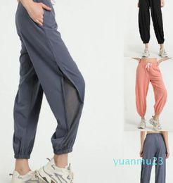 Pantalon de sport d'entraînement pour femmes, tenue de Yoga, sensation nue, pantalon de jogging en tissu, cordon de serrage à la taille, course à pied, danse avec deux poches latérales