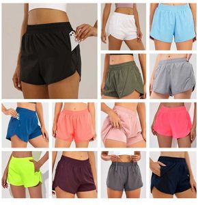 Vrouwen yoga -outfits kort gevoerde lopende dames sport shorts met rits pocket gym dames sportkleding voor meisjes oefenen fitness