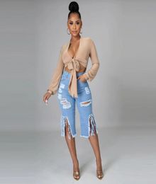 Femmes039s Pantalon Capris 2021 Fashion Hollow Out Ripped Jeans for Women High Tassels Patchwork Gnee Longuent Pant Streetwea8636177