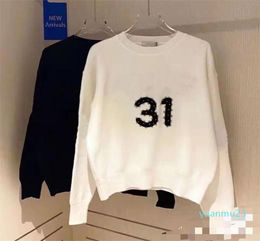 Women039s Jersey Heavy Letter Nail Bead Bordado Jersey de punto Suéter Otoño Invierno 22ss Nuevas Mujeres Sueltas Blanco Negro